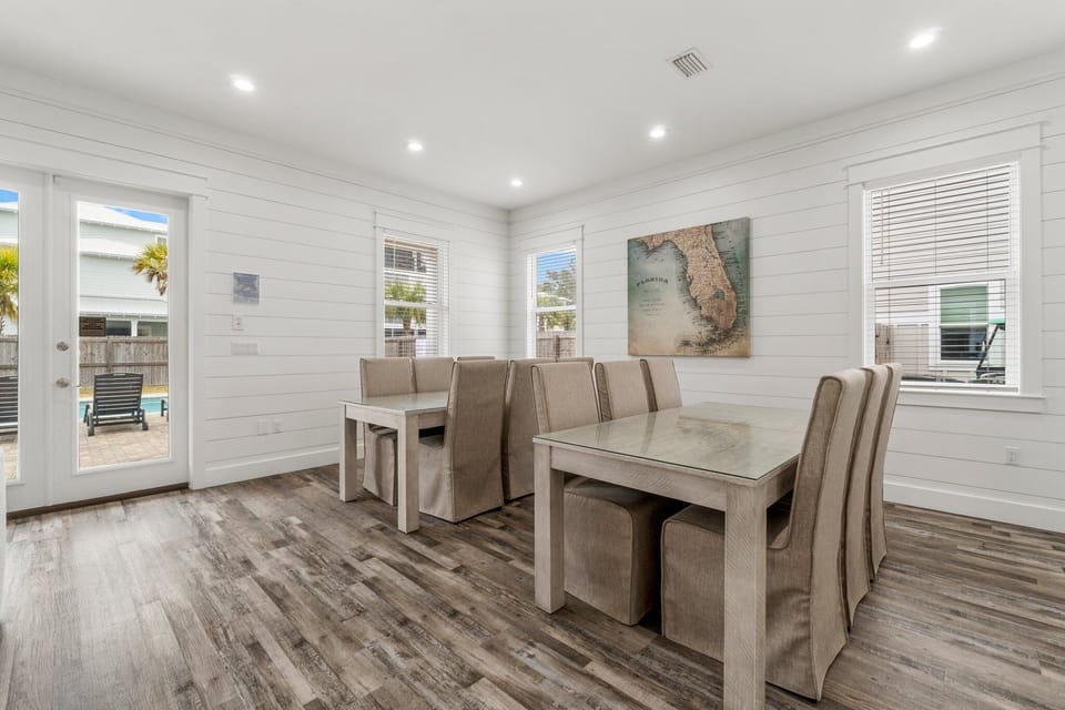 Dining Area On 1st Floor with Two Large Dining Tables
