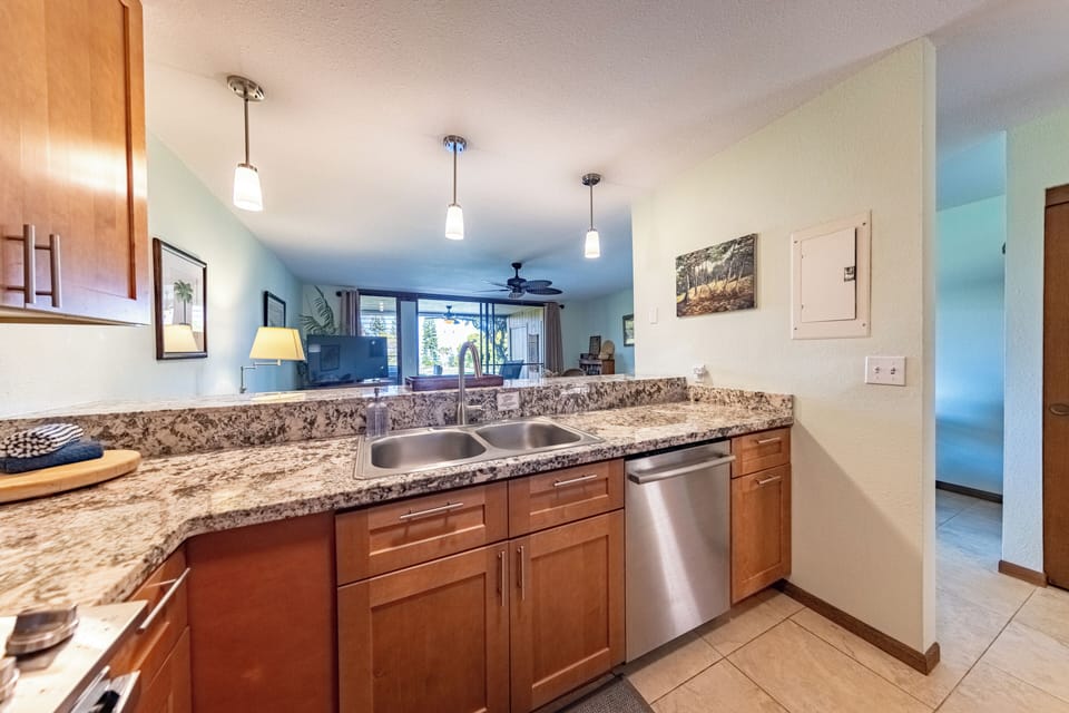 Kitchen with living area connection and ocean view.