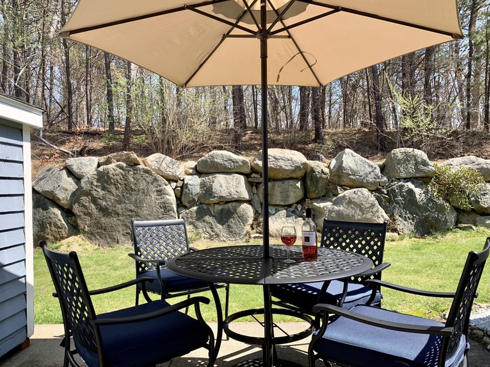 Patio seating for four with umbrella