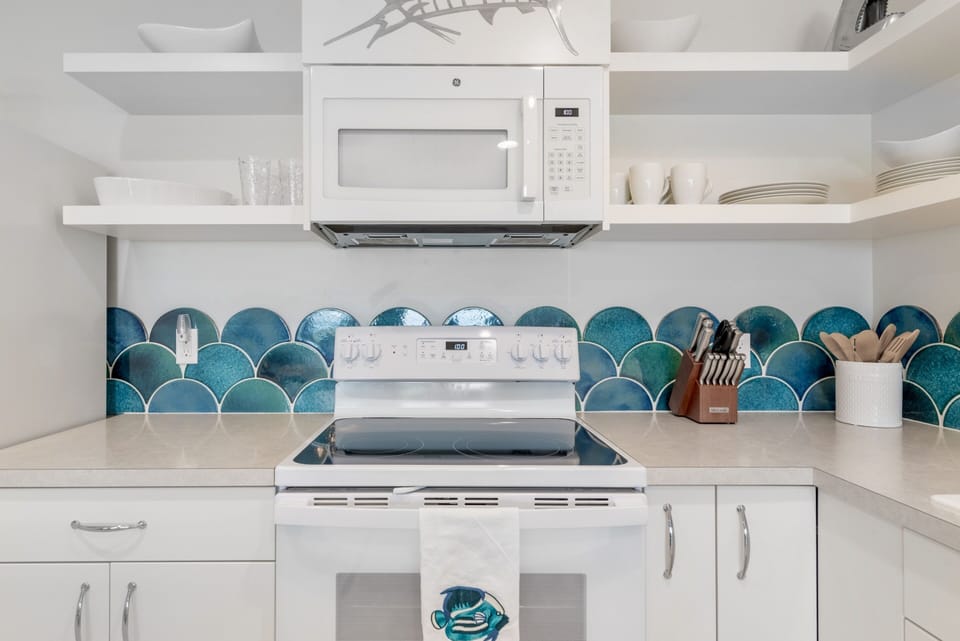 White cottage kitchen with open shelving