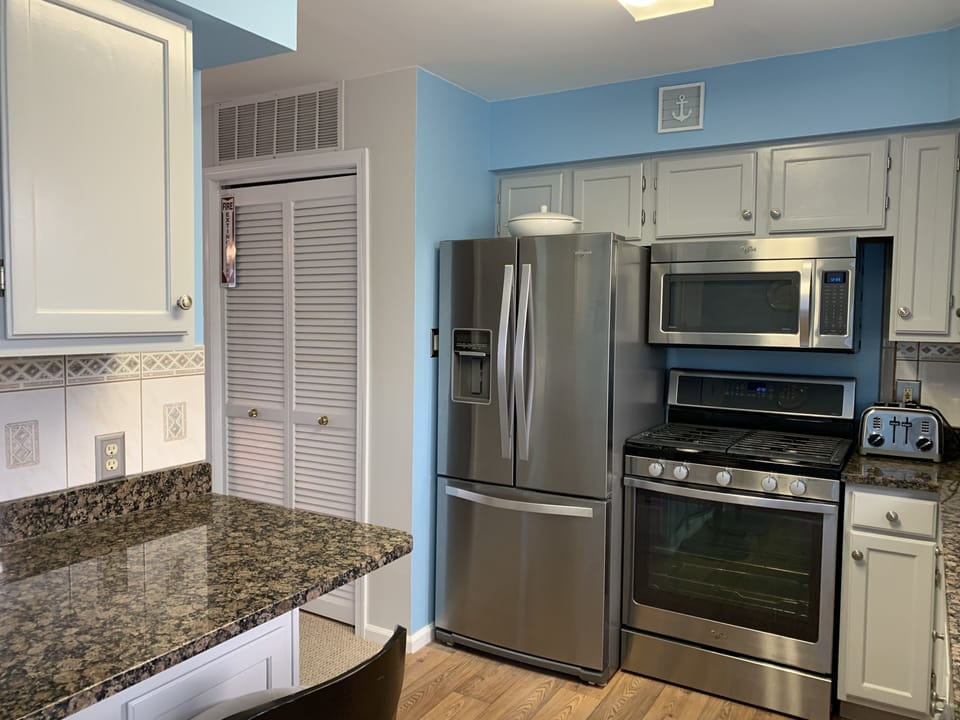 Fully Stocked Kitchen with Stainless Appliances