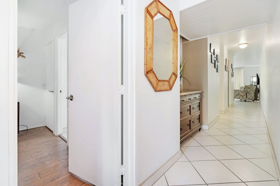 Hall between the bedroom and living room.