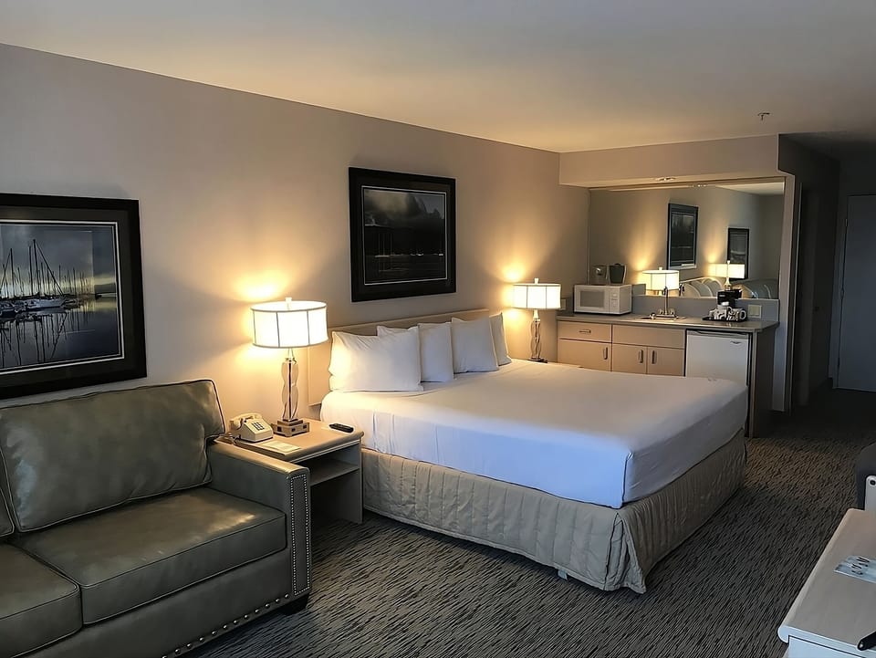 Recharge in a cozy room with convenient in-room refreshments.