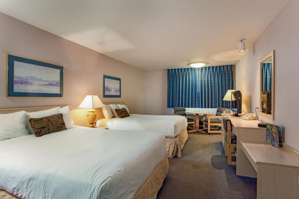 Settle into double beds with space to work and relax.