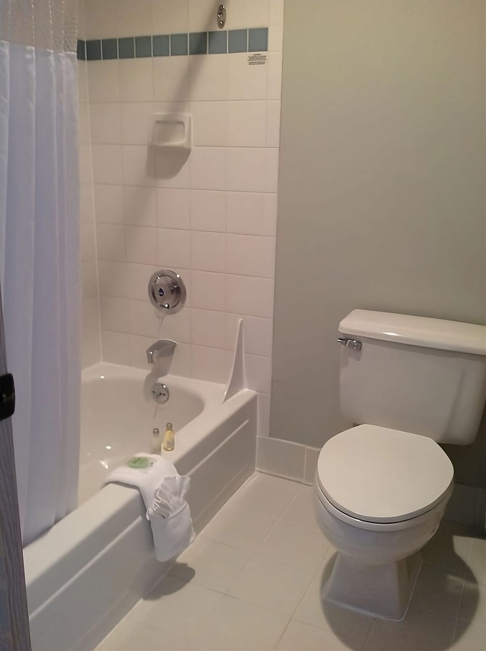 Refresh with a clean tub-shower combo and fluffy towels.