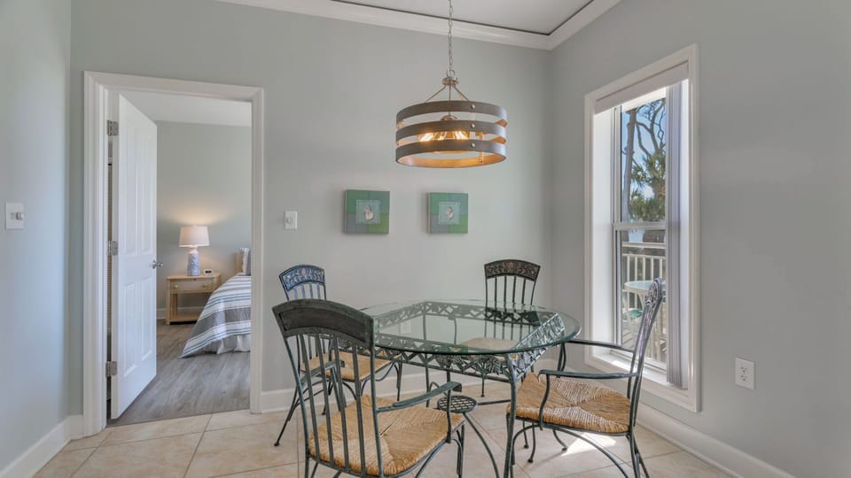 This light-filled dining nook offers a charming spot for casual meals and morning coffee.