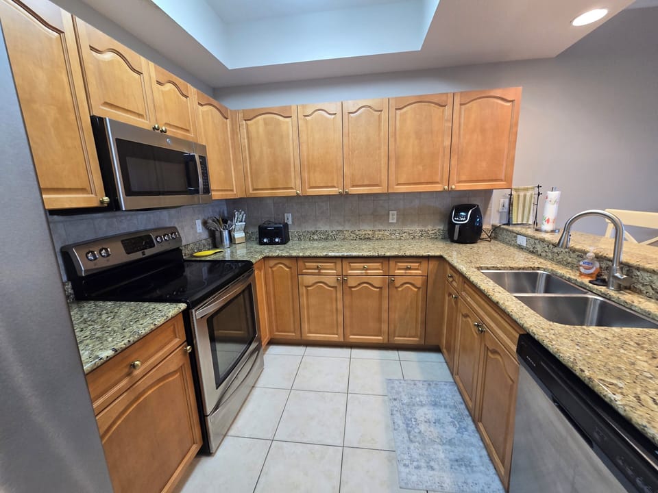 Full kitchen pov dining/living room