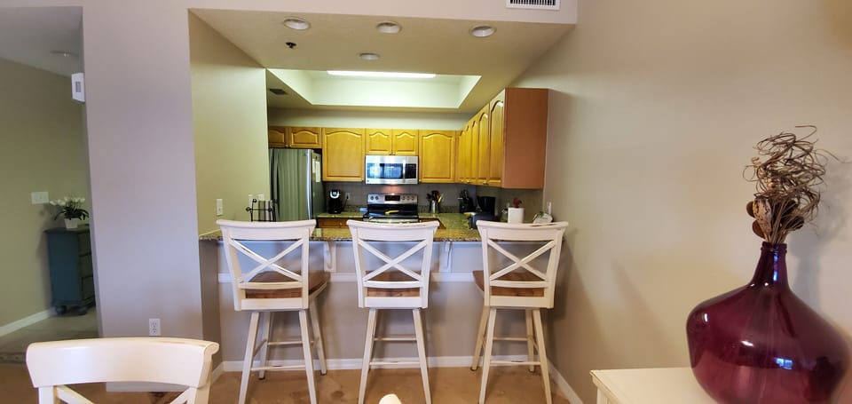 Counter seating and a dining table.
