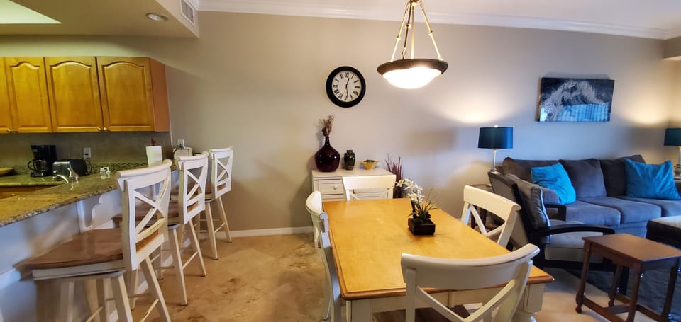 Counter seating for 3 and additional seating for 4 at the table. 