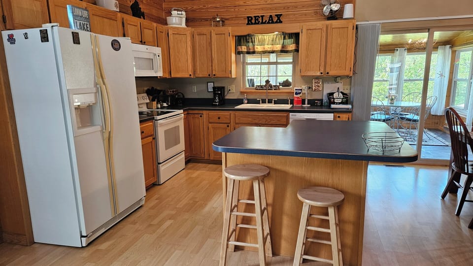 Well equipped kitchen.  Seating for 6 at the table plus a highchair.