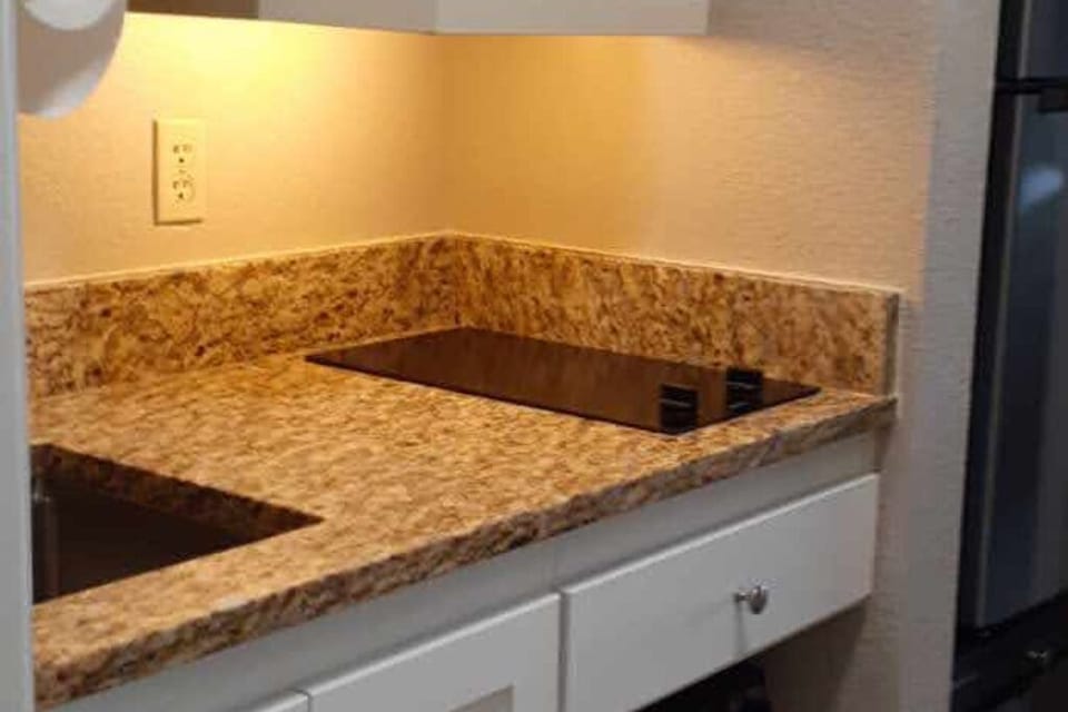 New countertop and glass cooktop.