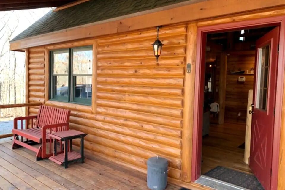 Cabin entrance and front porch to the left!