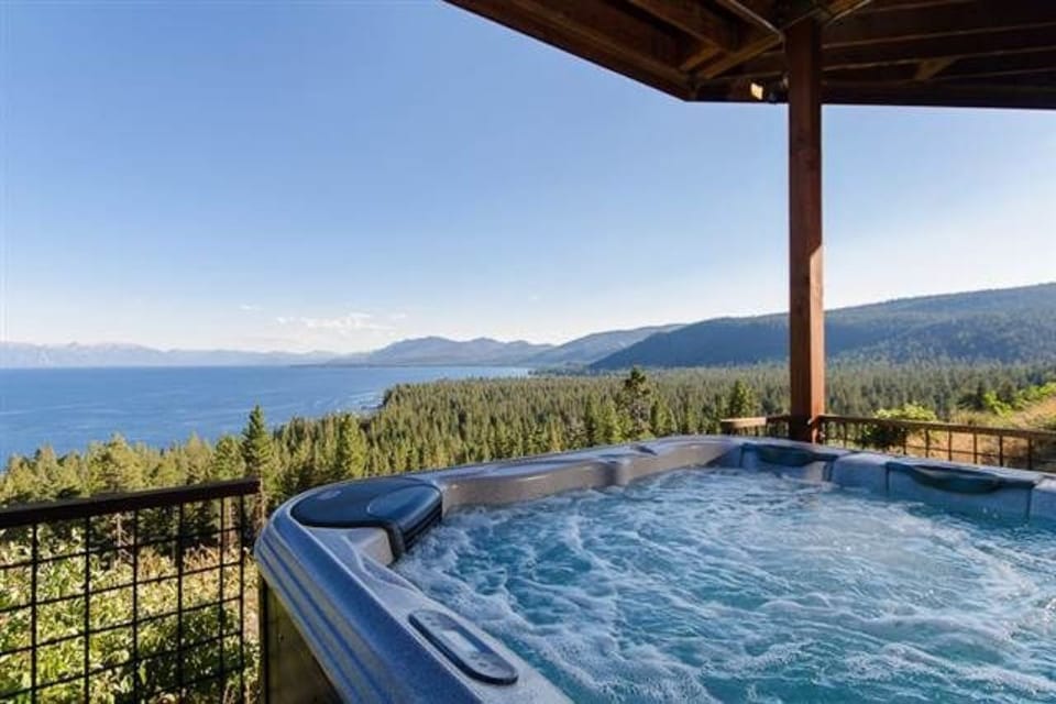 Hot tub with lake view.