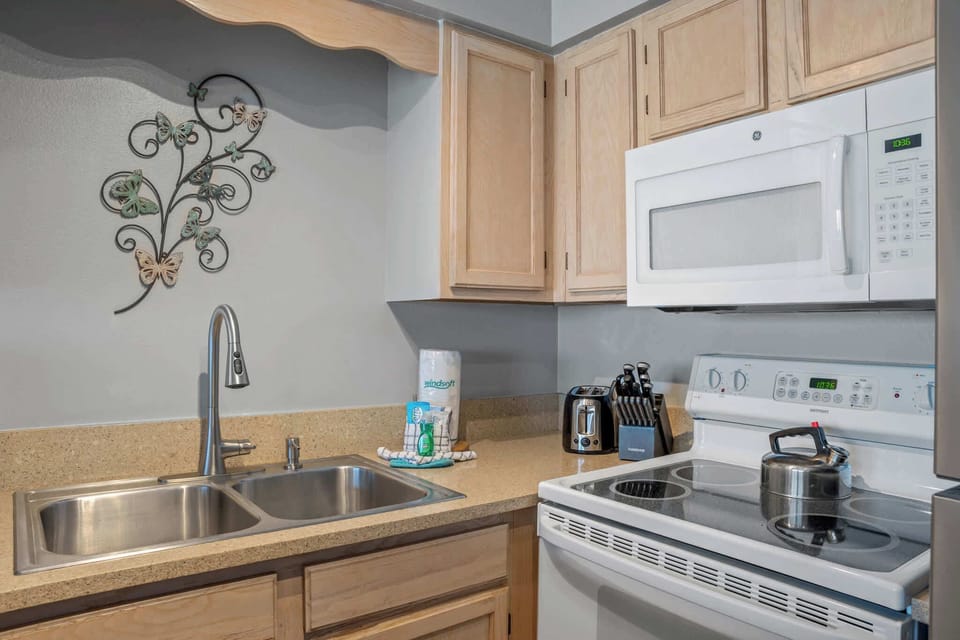 Our kitchen is stocked with a fridge, dishwasher, range, microwave, dishes, cutlery, pots & pans, crock pot, blender, toaster, griddle, and more! 