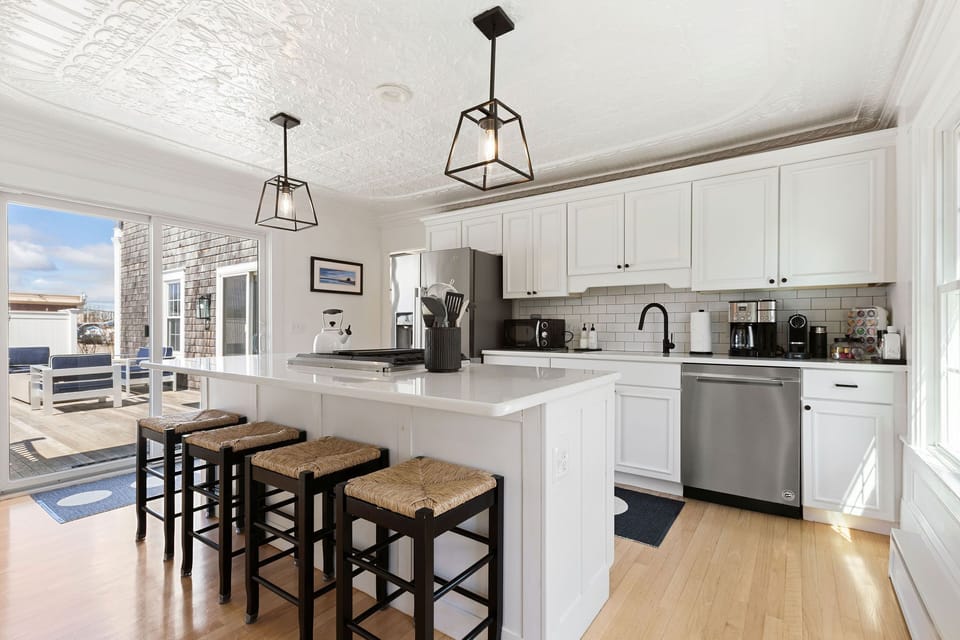 Gorgeous kitchen with original tin ceiling & new stainless steal appliances. 