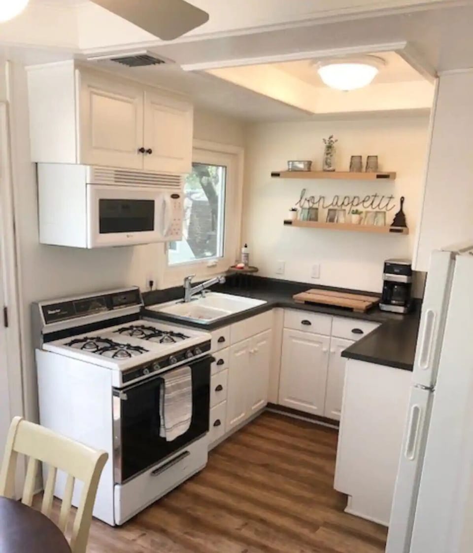 Well stocked kitchen with everything you need to make a delicious meal. 