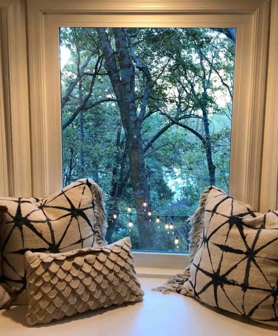 Lake and mountain view from the bay window in the upstairs bedroom. 