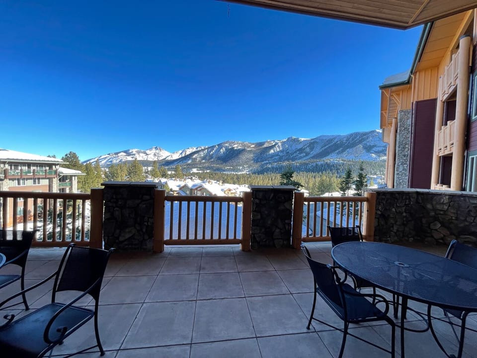 Common area deck with mountain view
