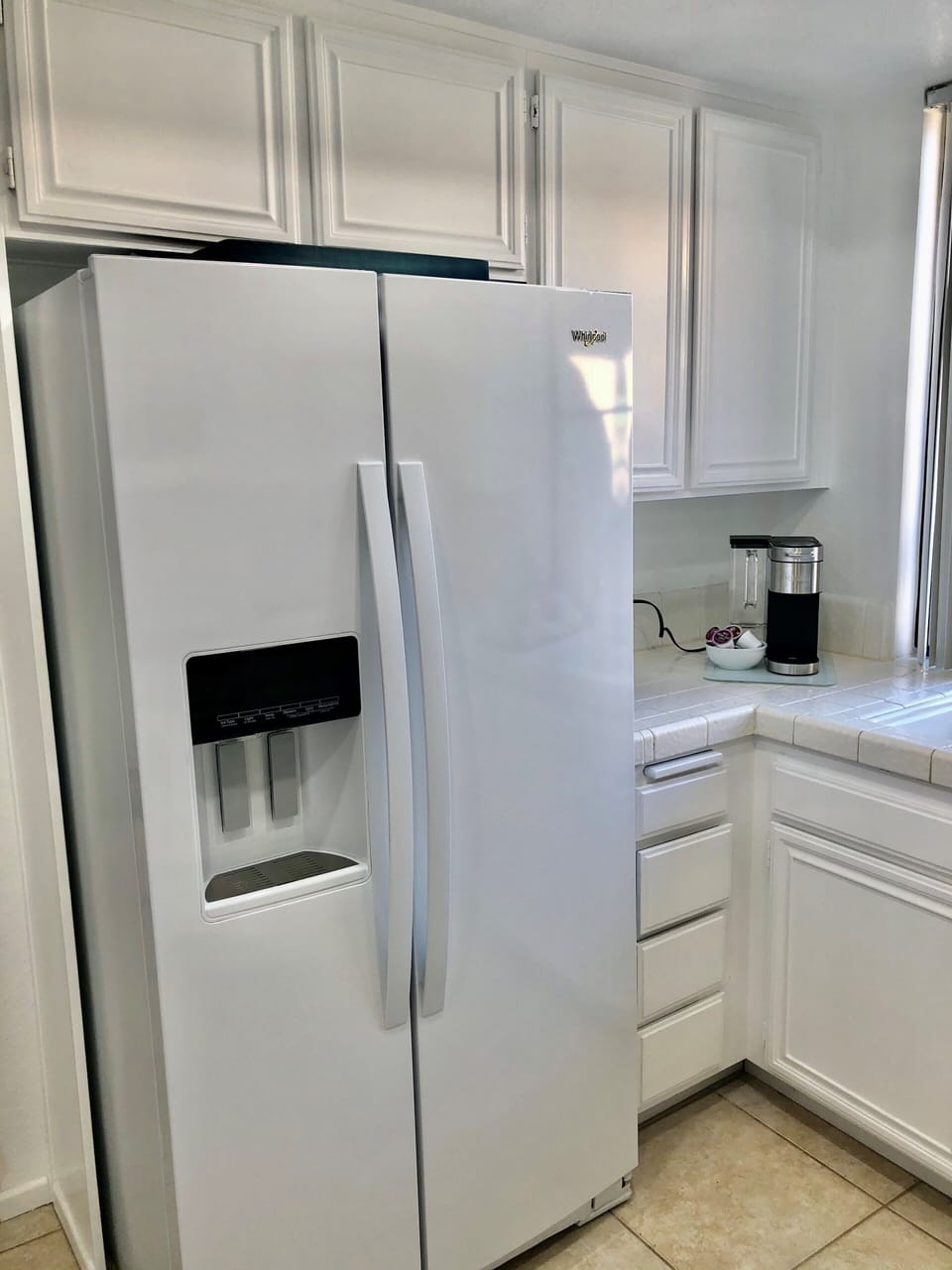 Brand new refrigerator.  I love the square ice cubes!