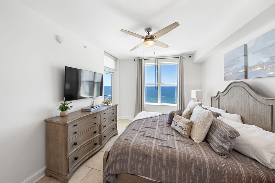 Wake up to breathtaking ocean views from your comfortable king bed, with crisp linens and gentle sea breezes through your window.