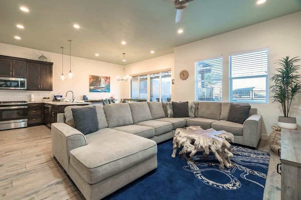 Open concept family room, kitchen and dining areas