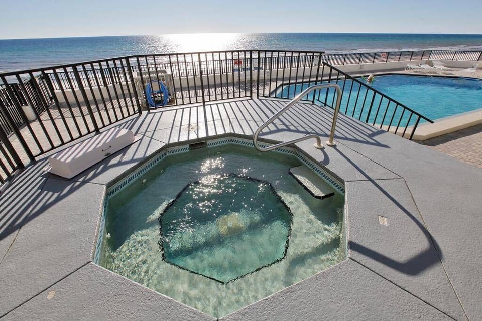 Beachfront pool (heated seasonally) and hot tub.