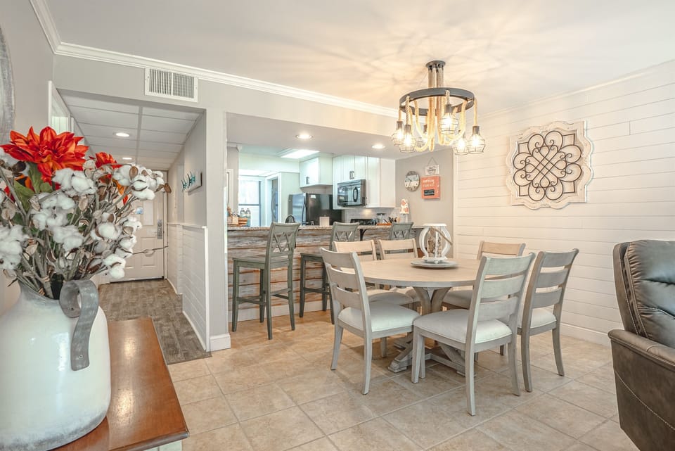 New 6-person dining table with cushioned seats + three bar seats
