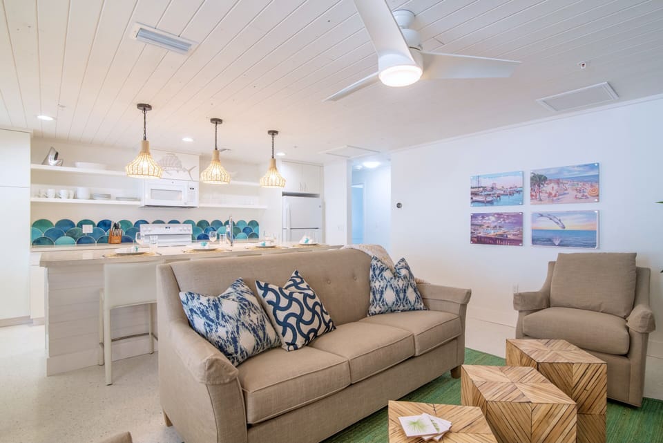 Relax in comfort with all new customized furnishings and queen sleeper sofa.