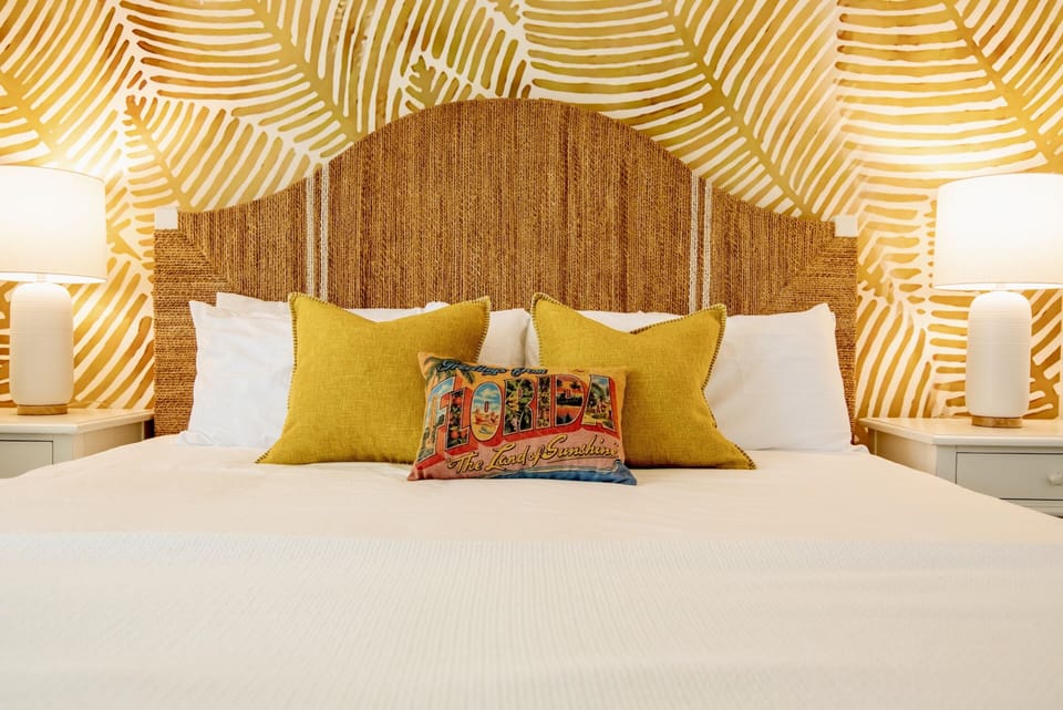 Comfortable king size bed with fresh bed linens