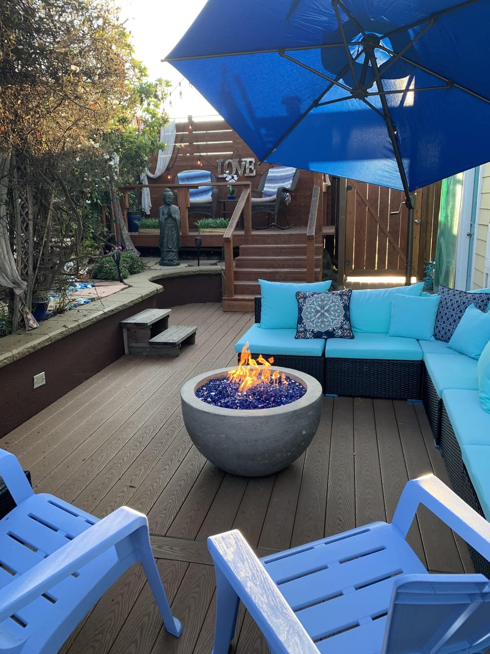 Amazing patio area with couches and firepit 