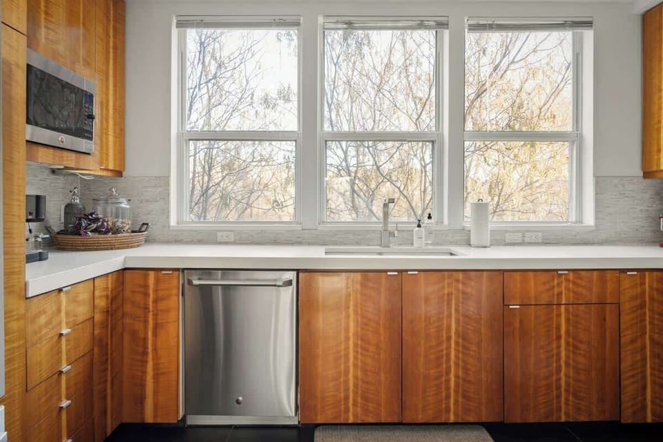 The kitchen has a lot of natural light