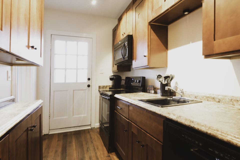 The well-appointed kitchen has the basic essentials to make yourself at home.