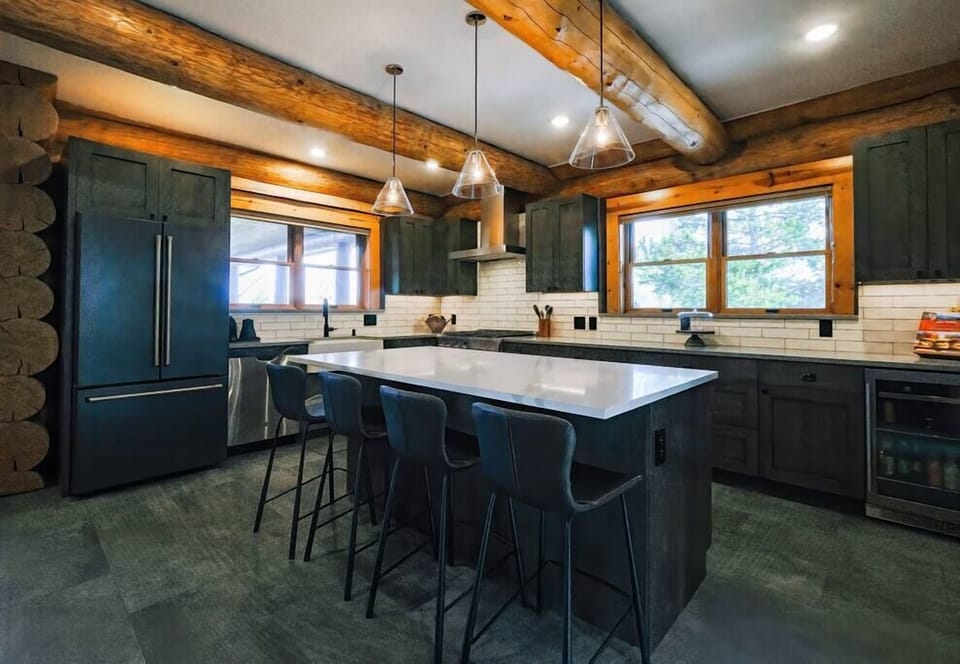 Newly remodeled gourmet kitchen with seating for 4 at the bar. 