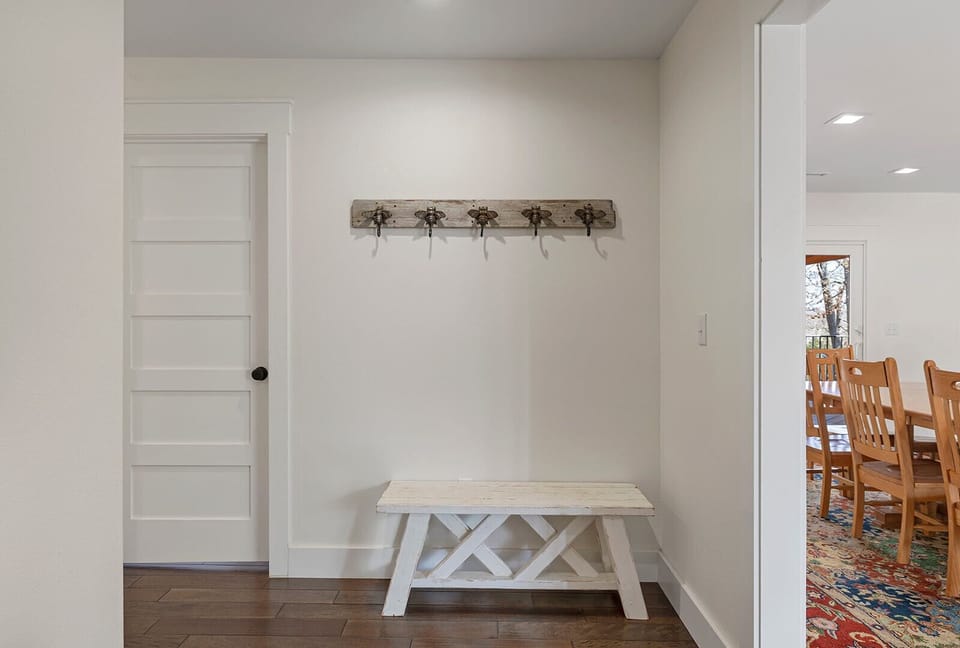 Family Entry - Bench, storage, kids table, basket of commonly needed items.
