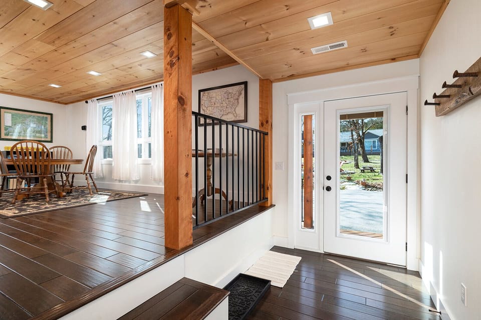 Enter and enjoy upscale finishes throughout your modern farmhouse home.
