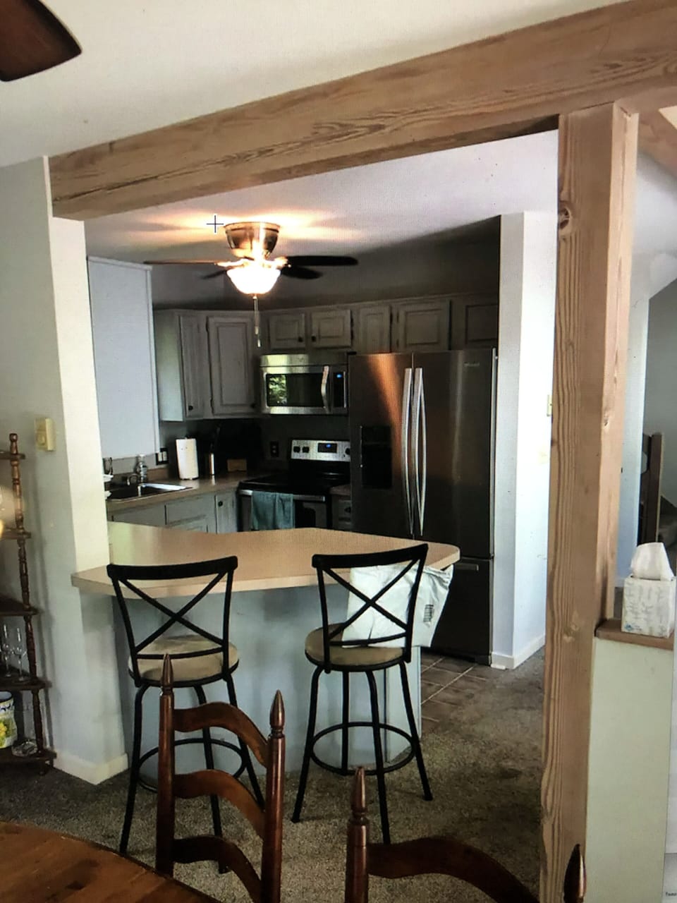 Kitchen bar facing into kitchen
