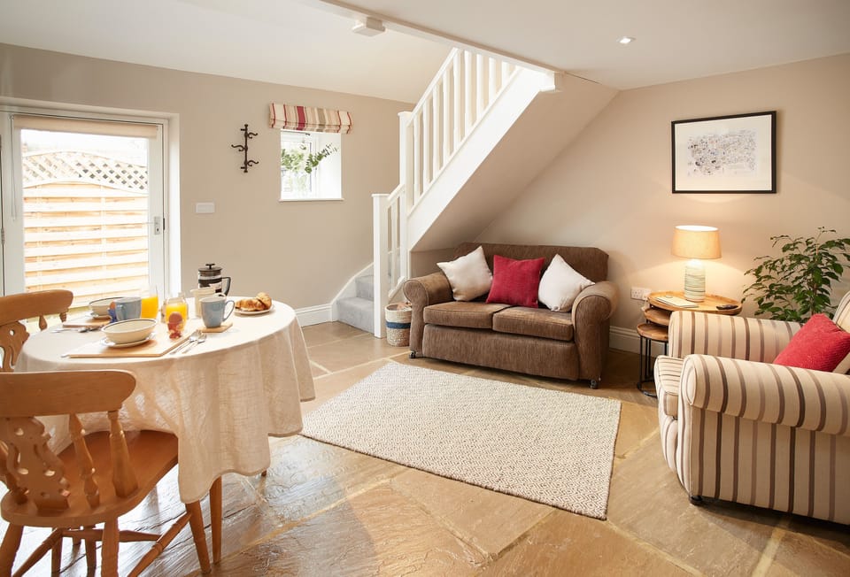 Ground floor: Enjoy a relaxing meal in the open plan dining area and sitting room