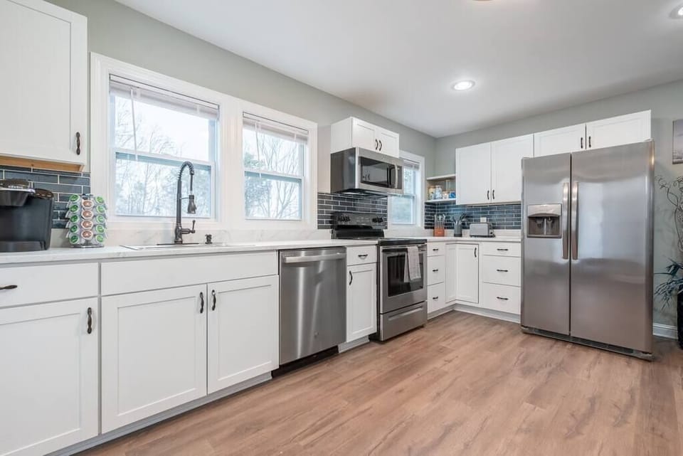Fully stocked kitchen with all new stainless steel appliances including dishwasher, Keurig, toaster and all supplies such as cream, sugar, coffee, splenda/equal, salt, pepper and more.