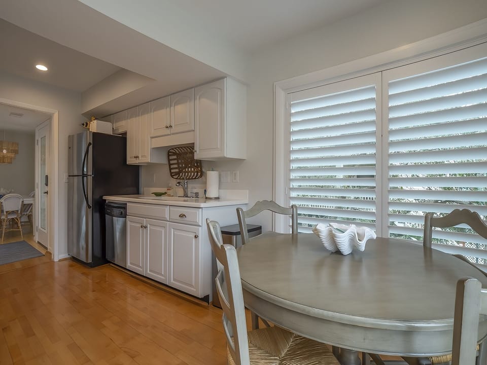 Kitchen adjoins breakfast nook which seats 4