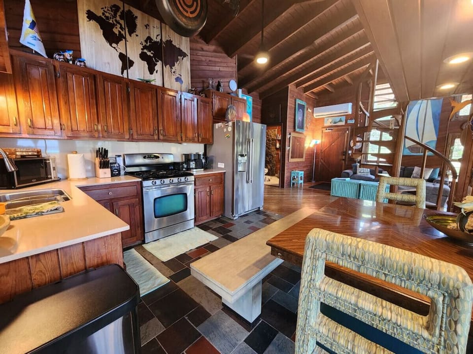 Fully stocked kitchen with gas stove, new fridge W/ ice maker and entire house water filtration system! Keurig & grinder for k cups or beans ;).