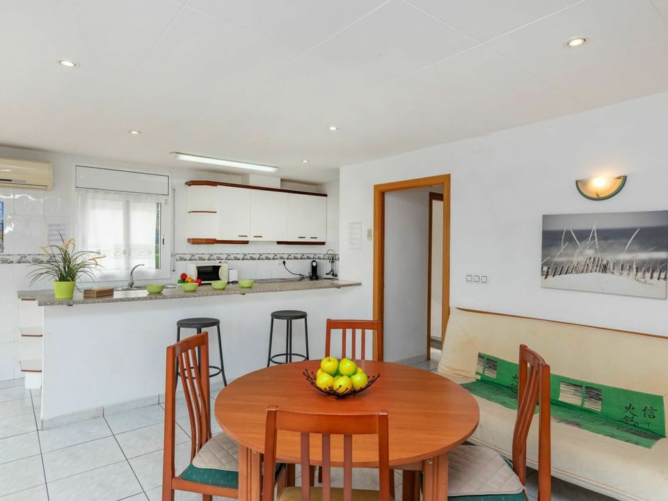 Table, Furniture, Countertop, Property, Cabinetry, Chair, Home Appliance, Wood, Orange, Kitchen