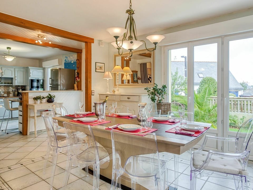 Table, Furniture, Countertop, Chair, Cabinetry, Houseplant, Window, Kitchen, Lighting, Wood