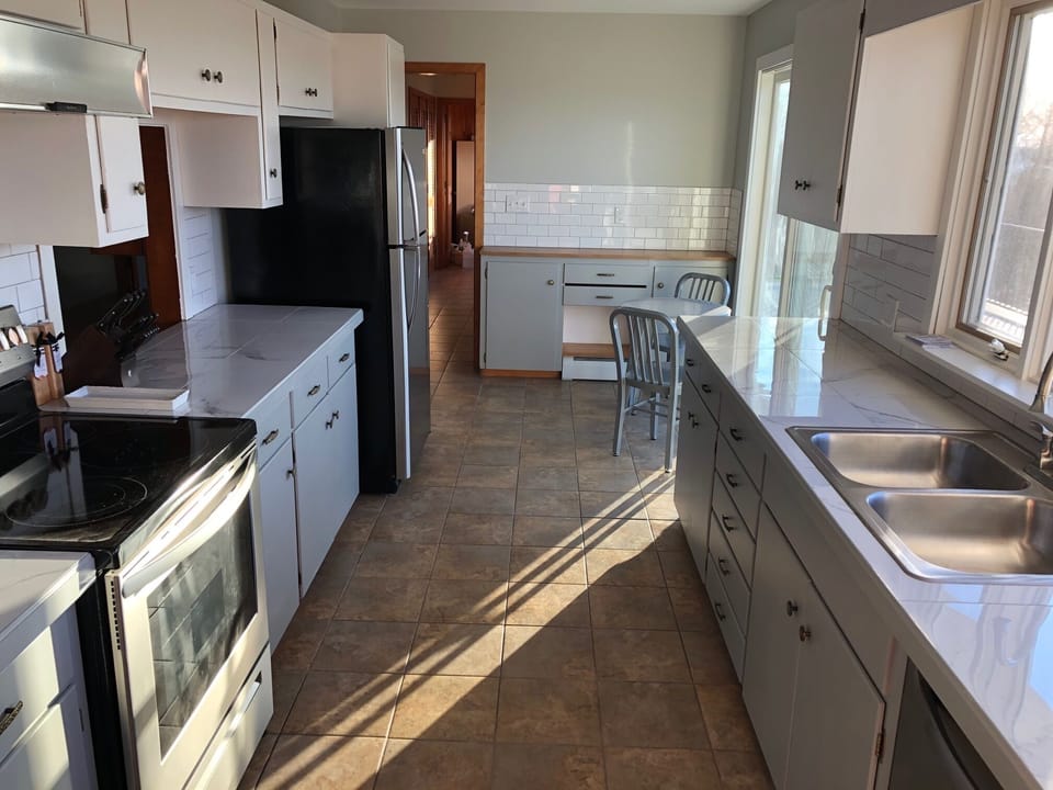 Kitchen overlooking the Mountain Range with Dining Room Passthrough