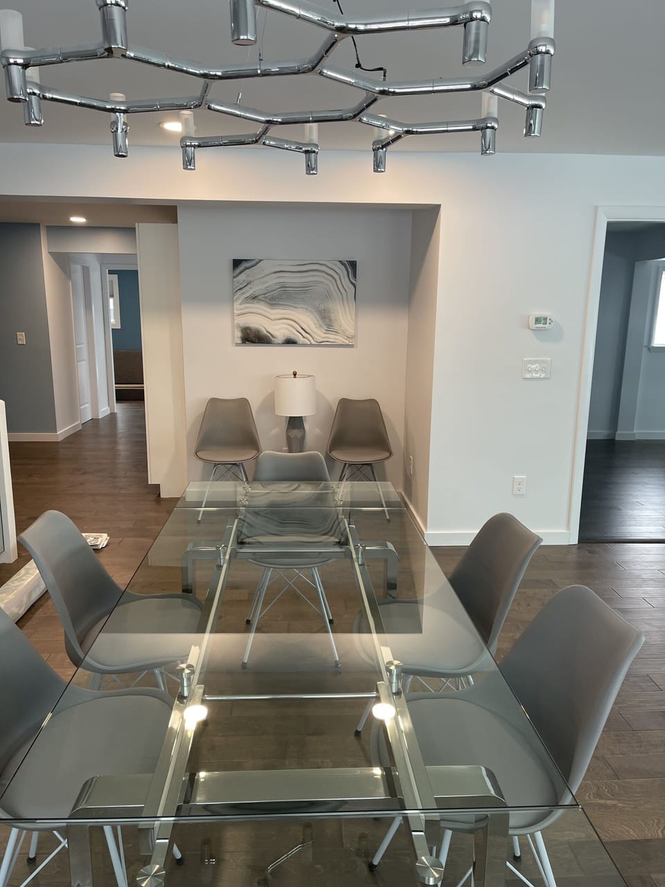 Large dining area with extendable table and plenty of extra chairs.  Views too!
