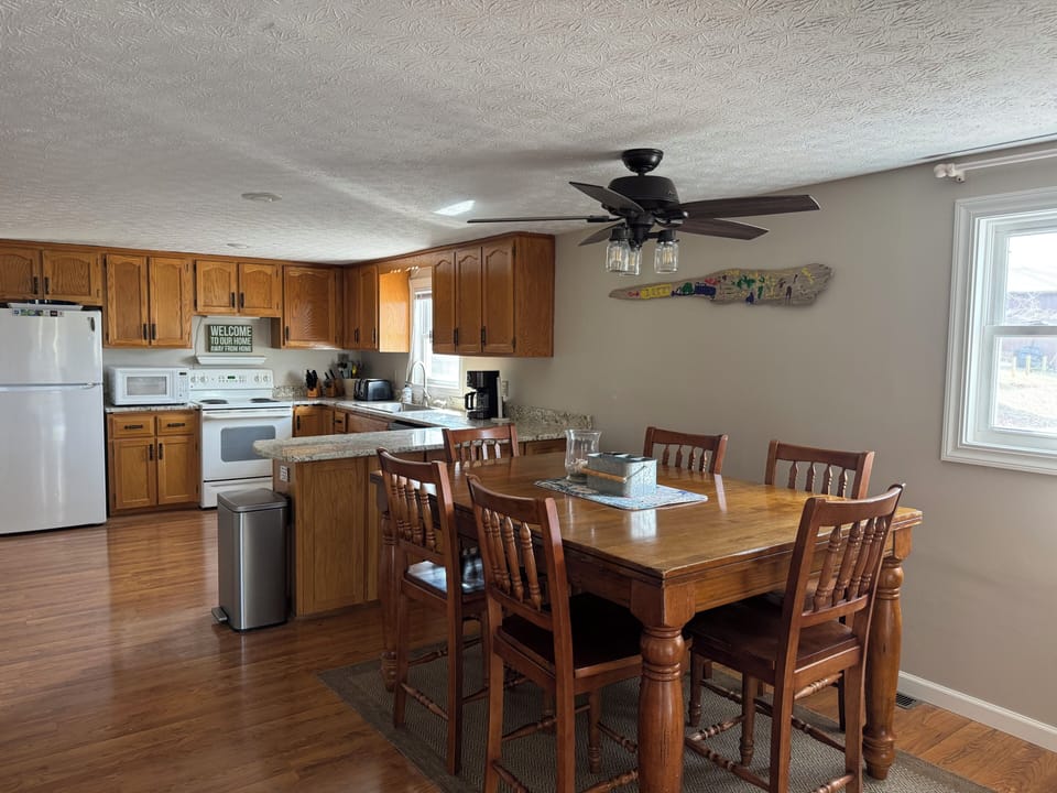 Plenty of room to host meals in the open concept kitchen and dining