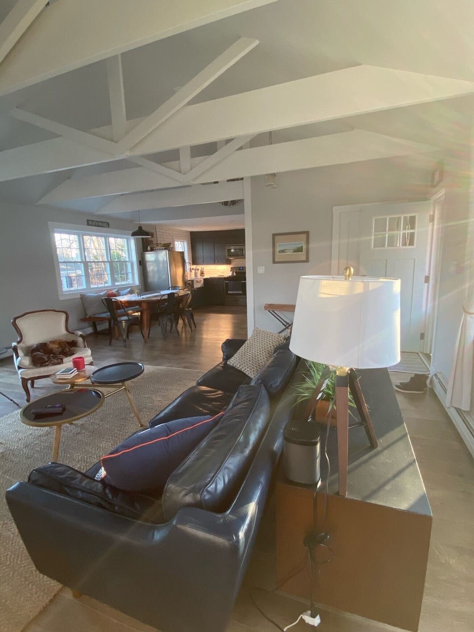Main living space with view to dining/kitchen.