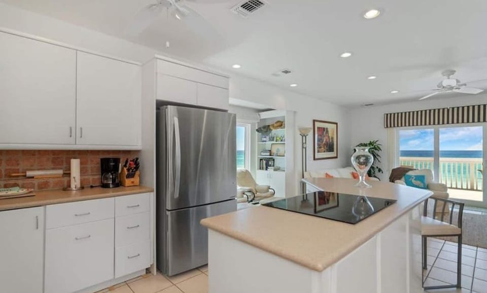 Modern kitchen with breakfast bar, beach and ocean views!