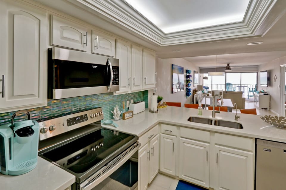 Fully Stocked Kitchen, with all new stainless steel appliances & quartz counters