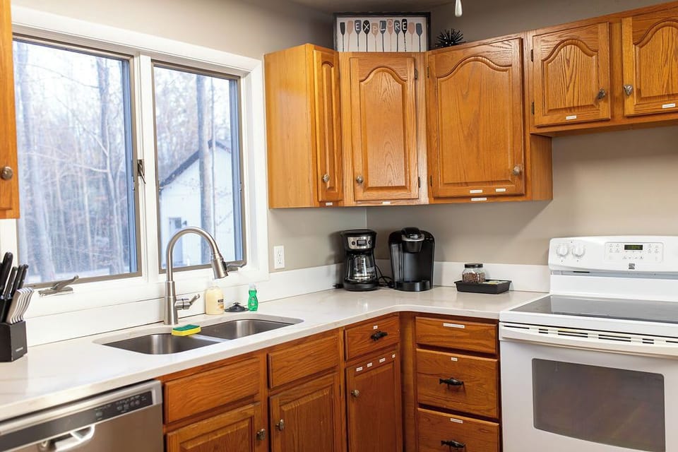 Main floor kitchen with spacious layout perfect for cooking and gathering