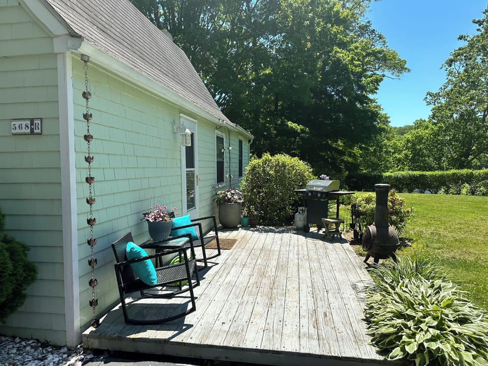 Access to backyard overlooking the Niantic River & 100ft+ private waterfront. 